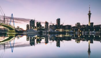 Auckland skyline reflected in water