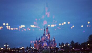 Blurry photo of Disneyland castle|park troopers unsplash