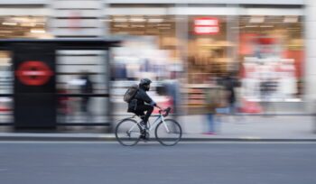 Cyclist on the road with background blurred