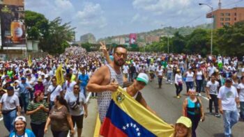 Mother of All Marches Holding Flag