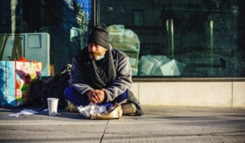 Person sitting on the street