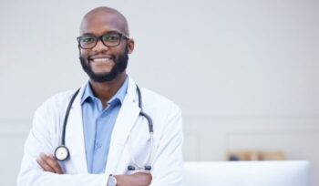 Shot of a young male doctor standing with his arms crossed in an office at a hospital