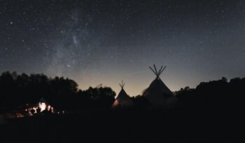 Tepees and fire at night