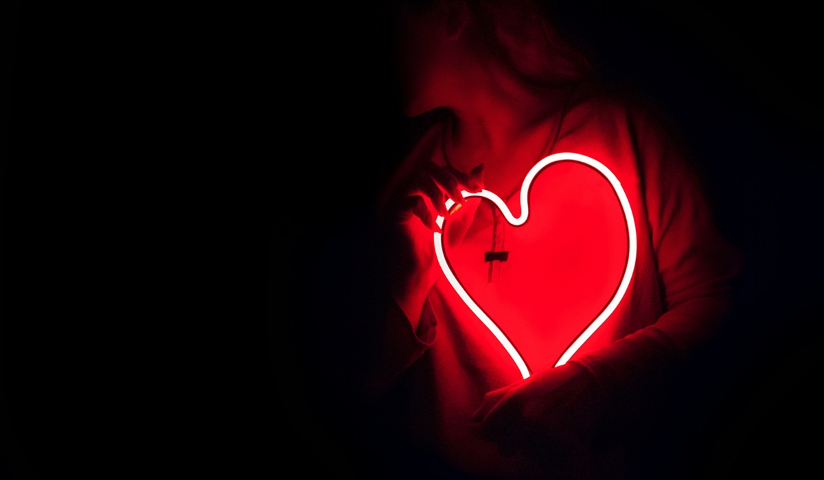 a neon sign of a heart (representing the passion of a thriving life)