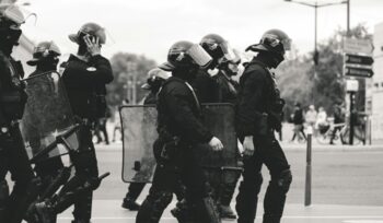 Law enforcement officers in masks